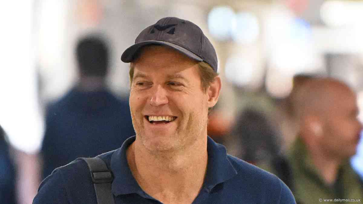 Dr Chris Brown in good spirits as he arrives in Melbourne for the Good Friday Appeal - after his I'm A Celebrity replacement Robert Irwin won over fans