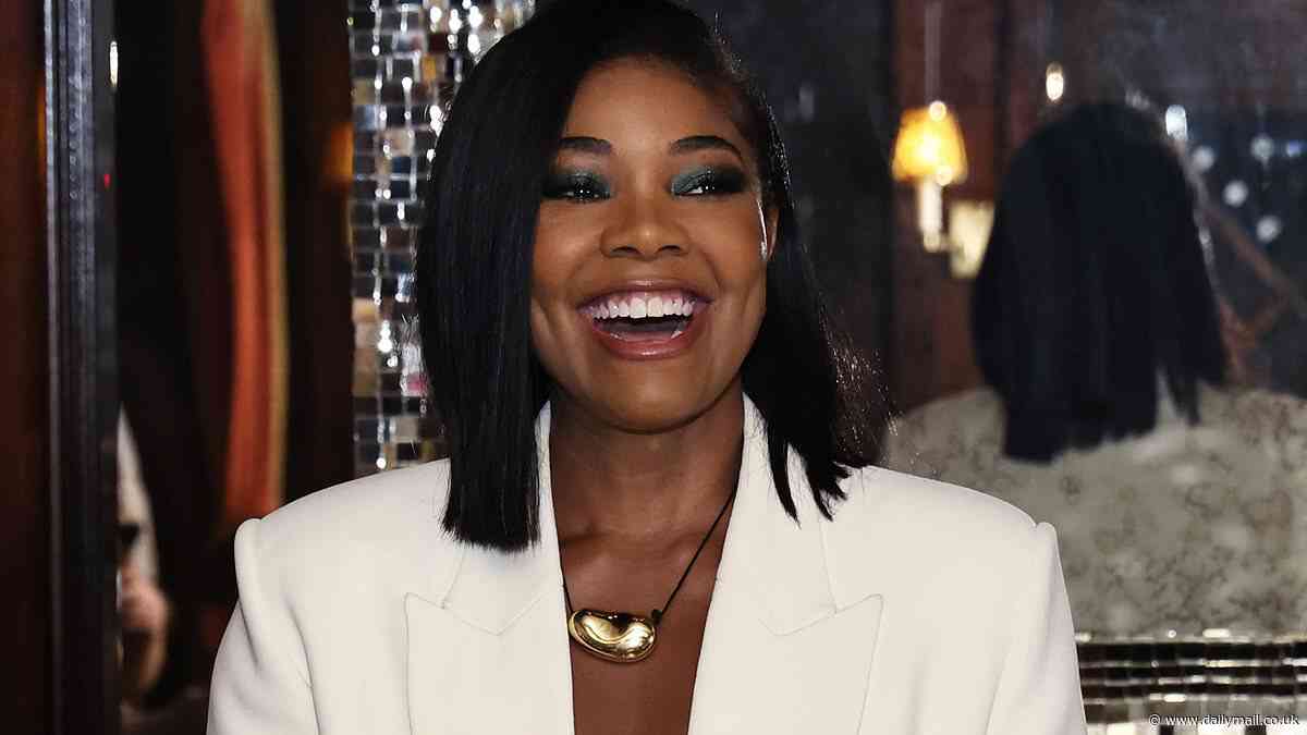 Gabrielle Union stuns with a sizzling crop top under a chic white blazer to celebration being named Global Brand Ambassador for Knix in New York City