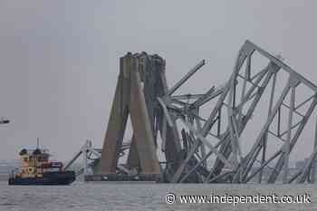 Watch live view of Baltimore bridge wreckage after two bodies found during recovery mission