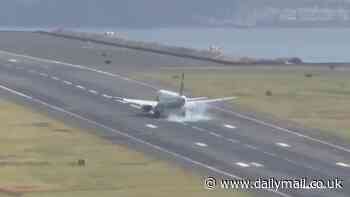 Terrifying moment passenger jet comes in to land at Madeira airport as the plane is thrown around in the wind before bouncing along the runway