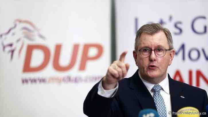 The leader of Northern Ireland’s largest unionist party steps down amid police probe