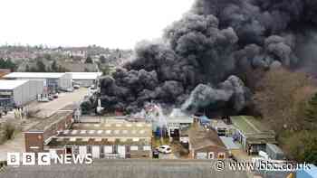 Smoke plume rises from industrial unit fire