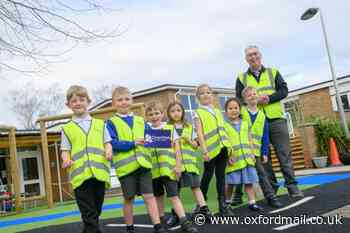 Charlton Primary School receives donation of hi-vis jackets