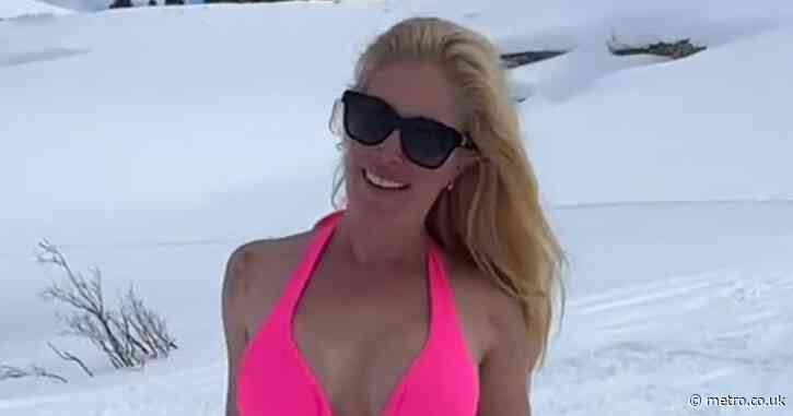 Reality TV legend bares bum cheeks on the slopes while skiing in bikini