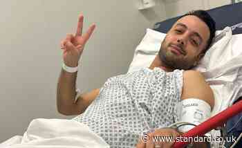 Iranian journalist shares defiant photo from hospital bed after being stabbed outside London home
