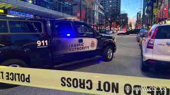 Daytime shooting closes down Vancouver's busy Robson Street to traffic and pedestrians