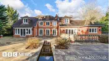 Mansion seized from £70m scammer up for sale