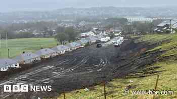 Landslip fear as travellers excavate behind homes