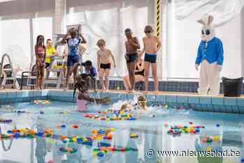 IN BEELD. Kinderen duiken naar paaseitjes tijdens jaarlijkse “paasplons’