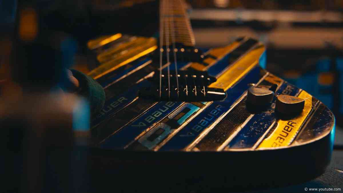Blues get custom guitar built out of hockey sticks