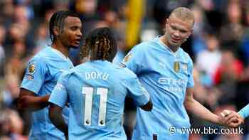 Man City thrash Luton to go top of table