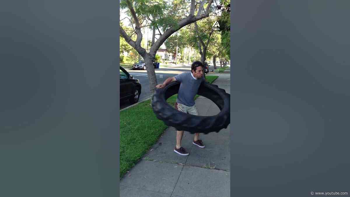 Michael Woolson proves he's made of steel and has got an iron will#Hulahoop #Tire #Workout #Weights