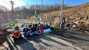 Protesters gather outside Pratt & Whitney in Middletown