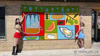 2 best friends paint mural for Windsor restaurant after thief breaks window