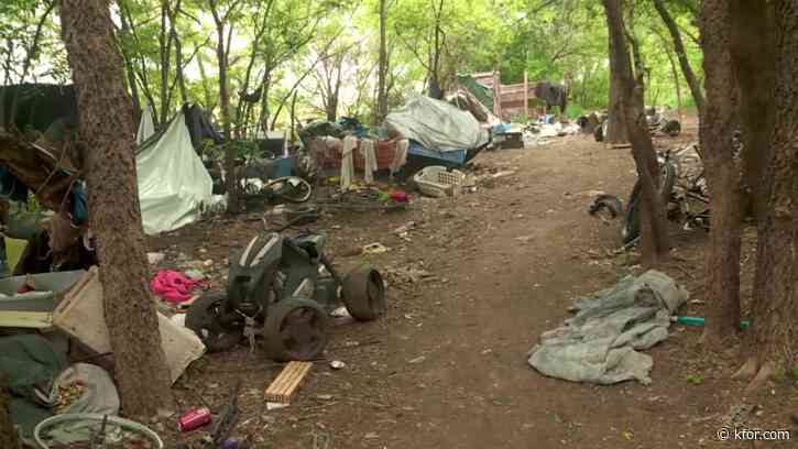 "It's tent, tent, trash pile," Son furious about homeless camp after dogs attack mother