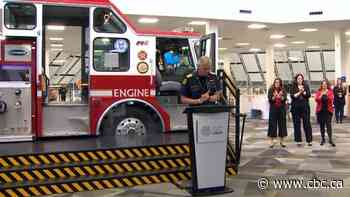 A big red fire truck is inside a Calgary library, and it's open for visitors