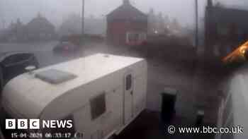 Wheelie bins fly and a caravan overturns in strong wind