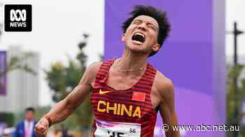 Kenyan explains controversial finish to Beijing half marathon after Chinese runner appears to be waved ahead