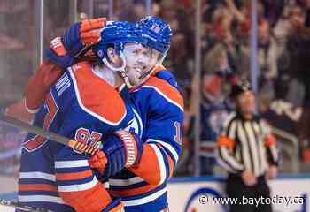 Oilers captain Connor McDavid records 100th assist of NHL season