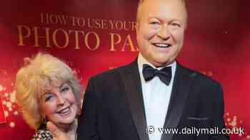 Emotional moment Patti Newton poses with her late husband Bert's wax figure at Madame Tussauds in Sydney