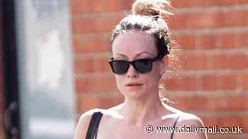 Olivia Wilde shows off her incredible figure in a skintight sports top and leggings as she leaves the gym