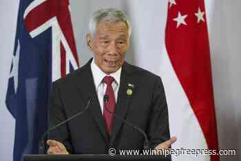 Singapore’s outgoing prime minister will stay on as senior minister, his successor says