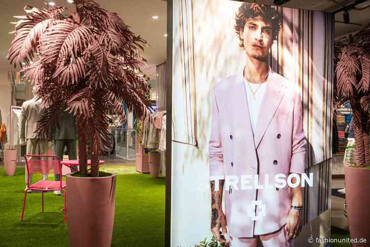 Sommer, Sonne, rosa Palmen: Strellson stellt Schaufenster um