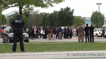 Wilmer-Hutchins High School students stage a walkout following Friday's shooting at the school