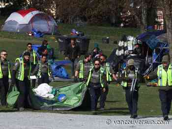 Vancouver park board rangers dismantle temporary CRAB Park structures