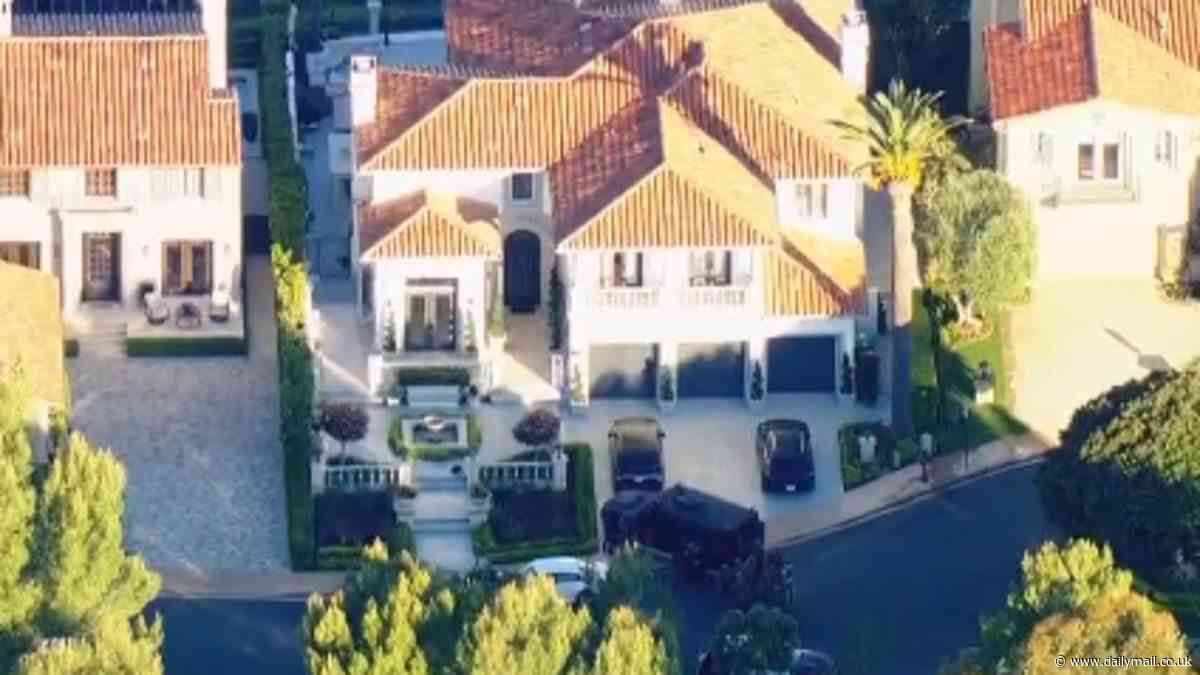 Newport Beach carnage as homeowner in $5million mansion shoots intruder who broke in with an accomplice at 4am while his family was sleeping- before second suspect 'commits suicide' after fleeing