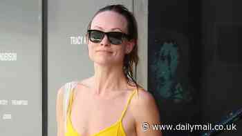 Olivia Wilde put on a perky display in a bright yellow tank top as she exits Tracy Anderson's gym where Jlo and Gwyneth exercise