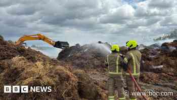 Haystack fire sparks smoke warning in village