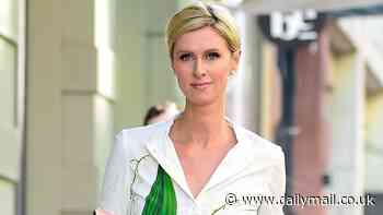 Nicky Hilton shines in white Oscar de la Renta maxi dress with green floral print while out and about in NYC