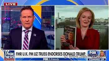 Face-palm! Liz Truss fails to hold her book right side up on Fox News as she endorses Trump send social media into hysterics