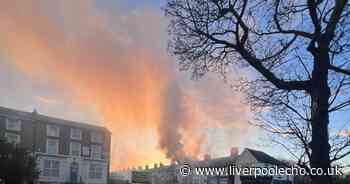Huge plumes of smoke seen as house goes up in flames