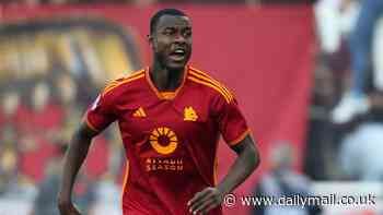 Roma's Evan Ndicka suffered a collapsed lung when he fell to the pitch clutching his chest during Serie A game at Udinese... as Daniele de Rossi says Ivorian 'luckily' hasn't got cardiac issues