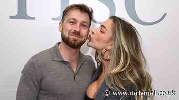 Zara McDermott plants a kiss on proud boyfriend Sam Thompson's cheek as they celebrate her new clothing line RISE at star-studded event