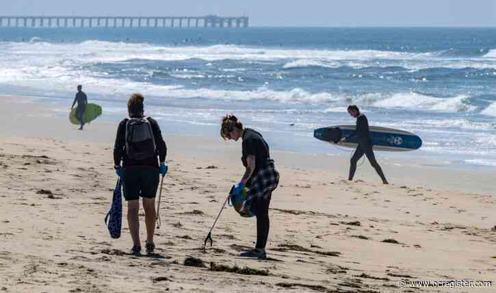 Earth Day effort gets early start on the sand; others ways to celebrate in Orange County