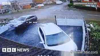 Car's crash into home captured on CCTV
