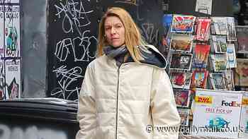 Claire Danes carries umbrella for bundled-up stroll in NYC - after celebrating her 45th birthday