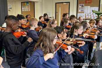 Thameside Primary School pupils have first violin lesson