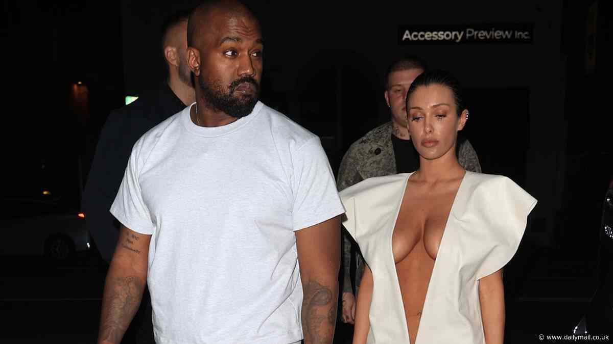Kanye West is named as suspect in police report for 'punching man in the face who grabbed his wife Bianca'