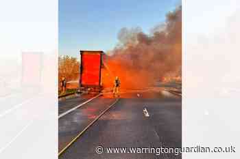 Dramatic photos from large lorry fire on M56 revealed