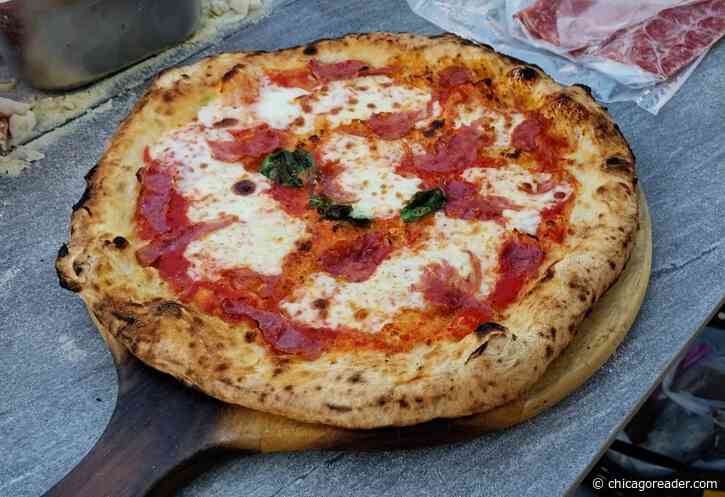 Pizza Dom throws dough on the patio at the next Monday Night Foodball