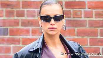Irina Shayk the sizzling supermodel rocks saucy triple-leather look as she turns NYC streets into a runway with her puppy in tow