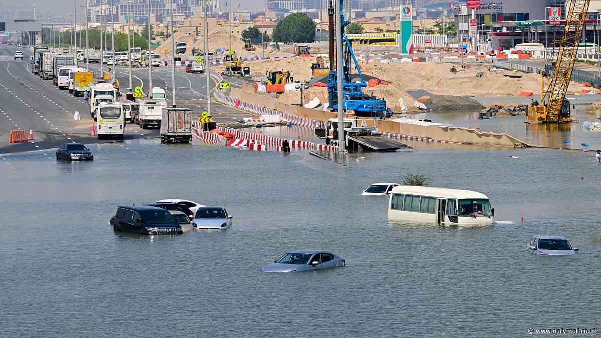 Dubai's sluggish return to 'normality': Planes gradually hit runways again but cars remain stranded in water as the city struggles to get to grips with flooding crisis