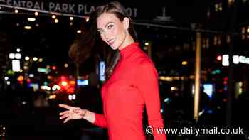Karlie Kloss exudes confidence in a bold red midaxi dress as she attends star-studded Carolina Herrera fashion event in NYC
