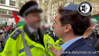 Revealed: Man threatened with arrest by police for 'breaching the peace' by being 'quite openly Jewish' near Gaza march is chief executive of leading Jewish group - as he calls for mass demo in response