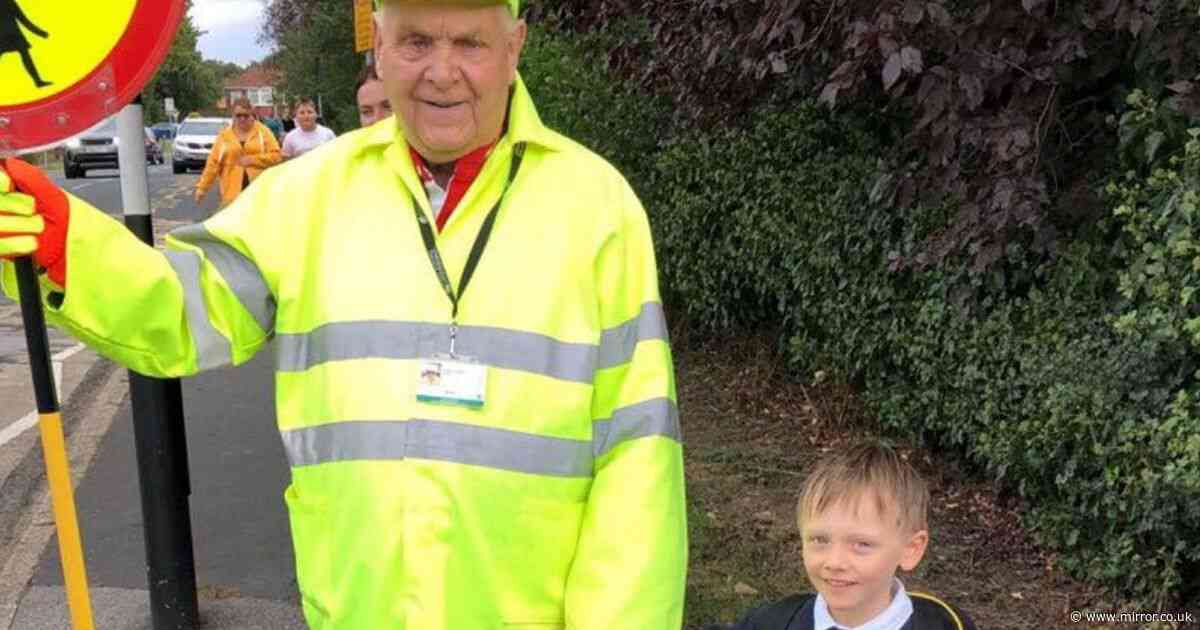 Britain's oldest lollipop man, 86, retires after 'wonderful' career helping kids cross road