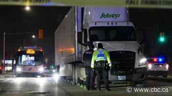 Woman hit by semi-trailer, rushed to hospital in critical condition
